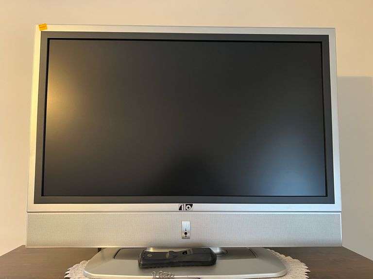 ilo Flatscreen Television with Remote - Kaufman Realty & Auctions