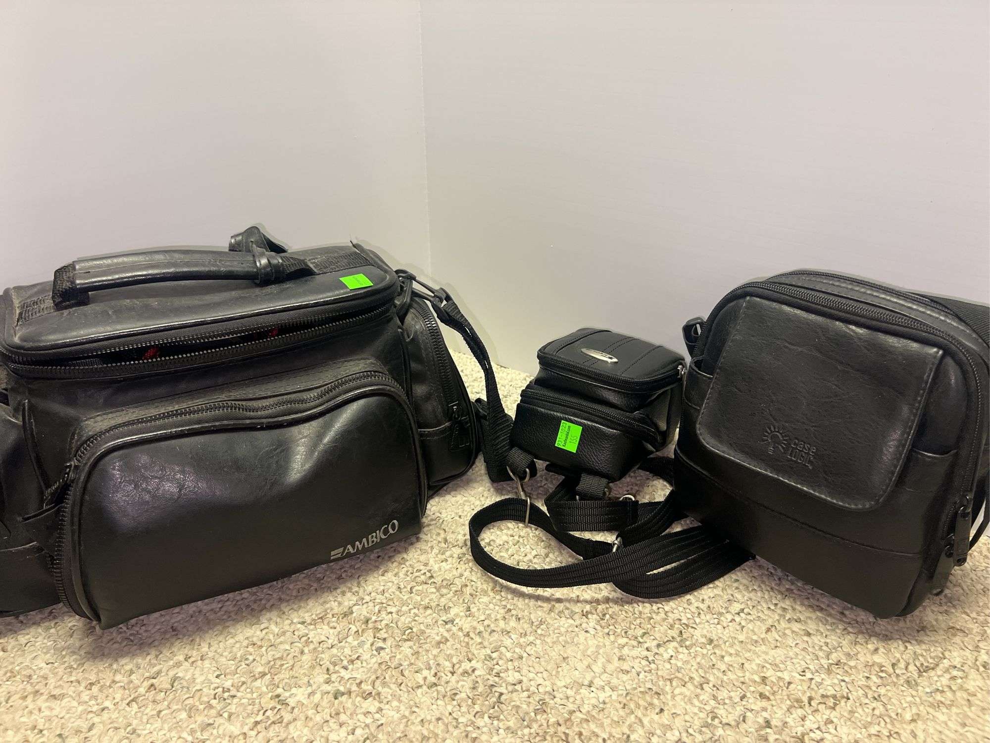 (2) Camcorders and (1) Camera