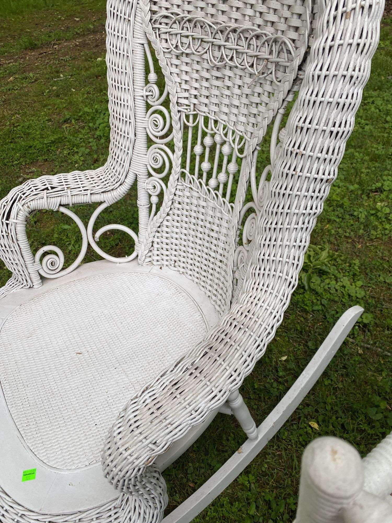 White Wicker Rocking Chair and Flower Basket