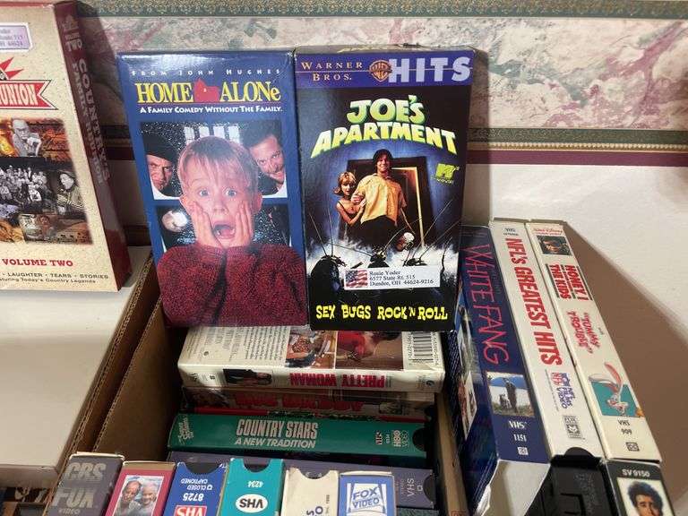 Large lot of VHS tapes, CD’s and DVDs