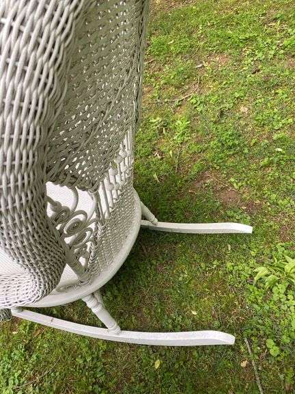White Wicker Rocking Chair and Flower Basket