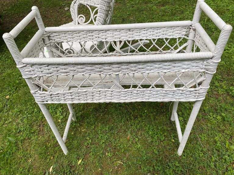 White Wicker Rocking Chair and Flower Basket