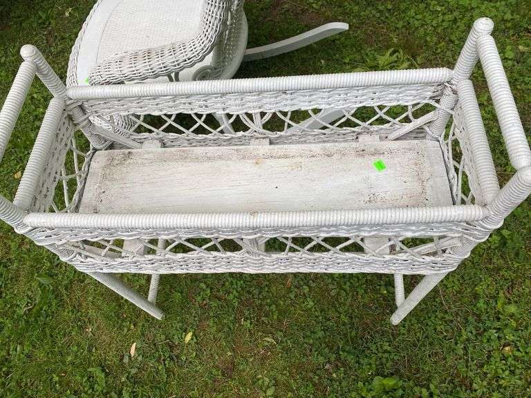 White Wicker Rocking Chair and Flower Basket