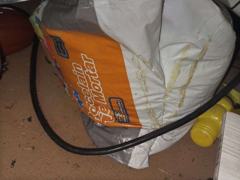 (6) Boxes of True Porcelain Waterproof Tile Flooring and (1) Bag of Porcelain/Tile Mortar