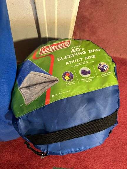 Coleman sleeping bag, lawn chair and yard sticks
