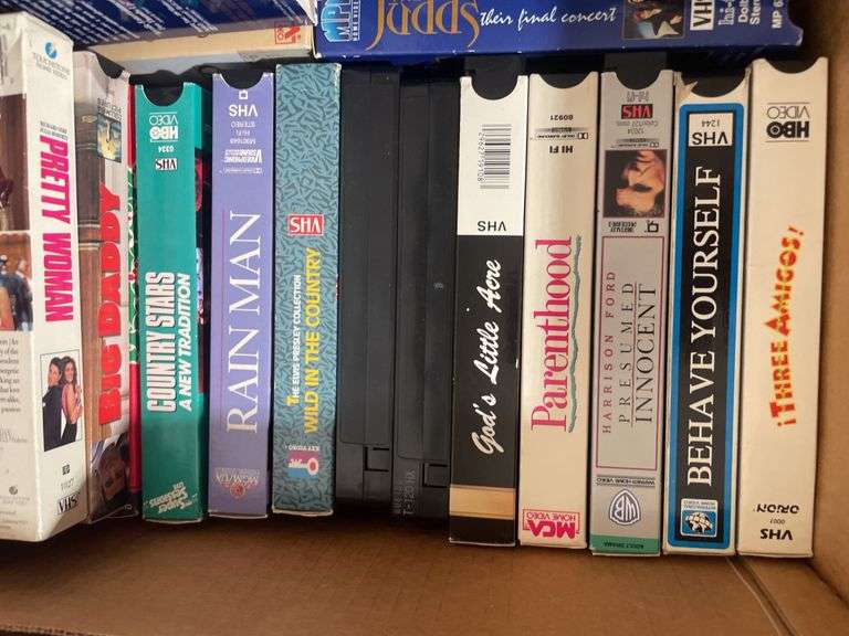 Large lot of VHS tapes, CD’s and DVDs