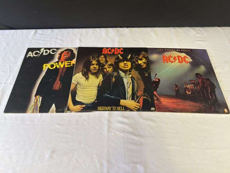 (3) AC-DC Vinyl Records - Kaufman Realty & Auctions