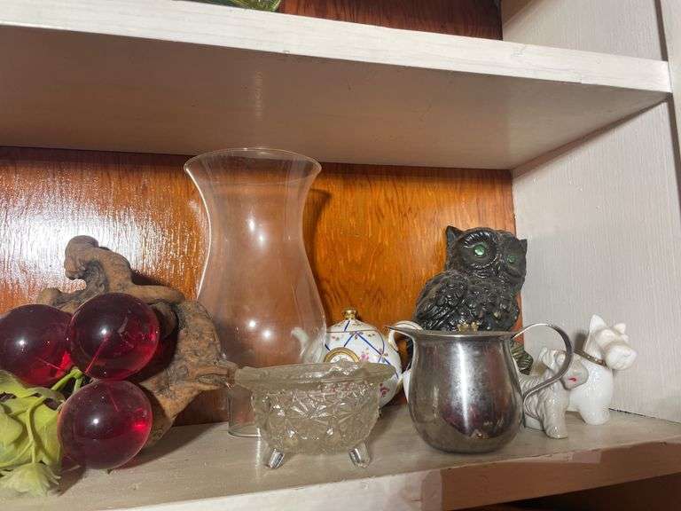 (2) shelves of glassware including bookends, vases, figurines & more