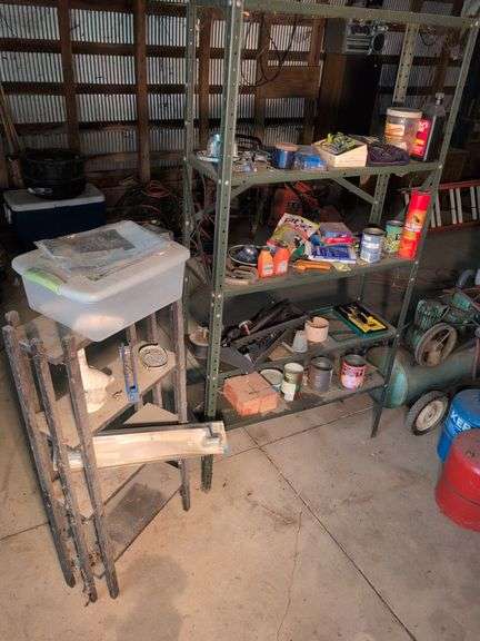 Metal shelving and wooden shelving - both with contents