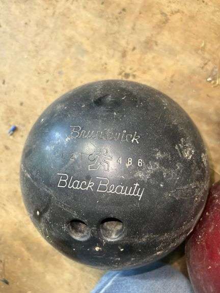 4 Bowling Balls and Bowling Pins