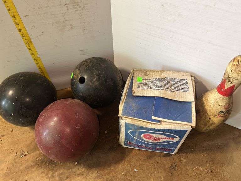 4 Bowling Balls and Bowling Pins