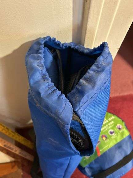 Coleman sleeping bag, lawn chair and yard sticks