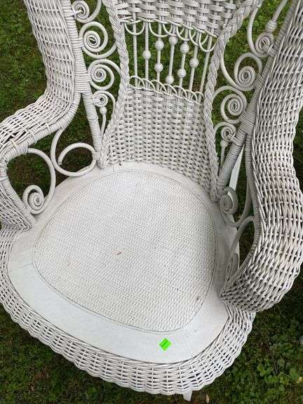 White Wicker Rocking Chair and Flower Basket