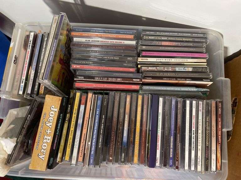 Large lot of VHS tapes, CD’s and DVDs