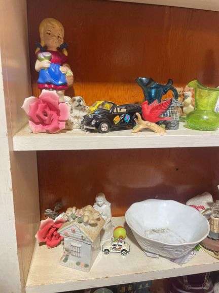 Contents of 3 shelves including decorative glassware- pitchers, bowl, basket, figurines & more