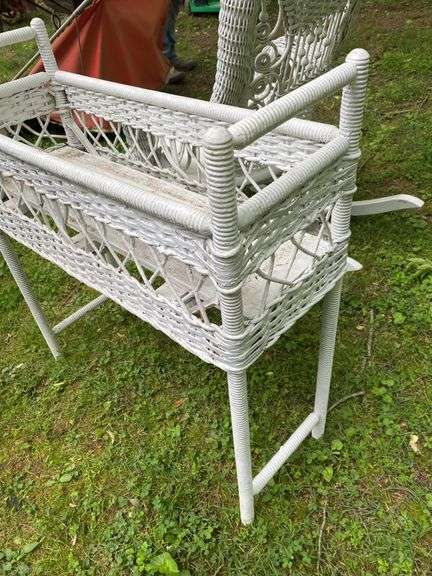 White Wicker Rocking Chair and Flower Basket