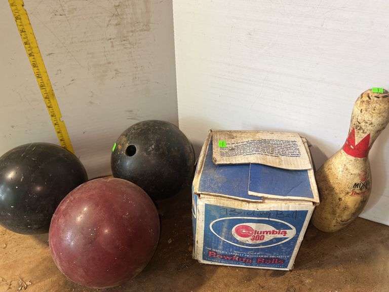 4 Bowling Balls and Bowling Pins