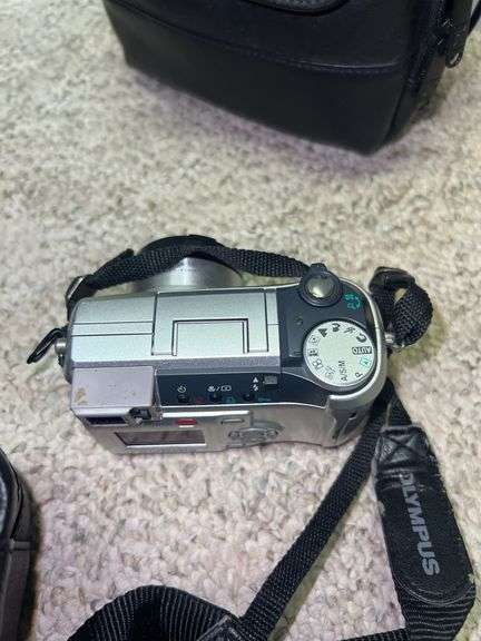 (2) Camcorders and (1) Camera