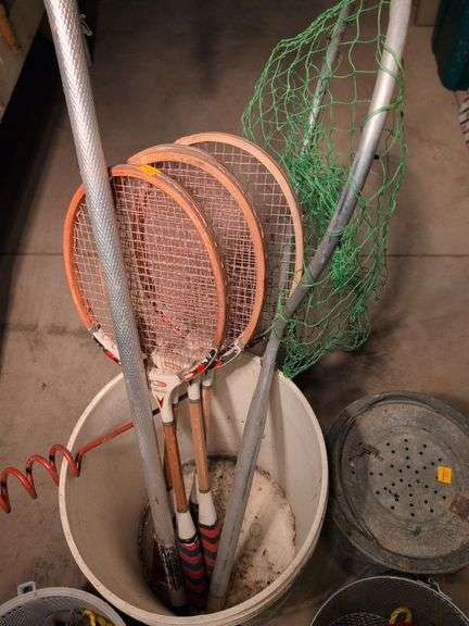 Large assortment of fishing supplies - nets, minnow traps, and more