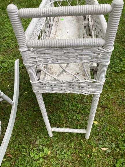 White Wicker Rocking Chair and Flower Basket