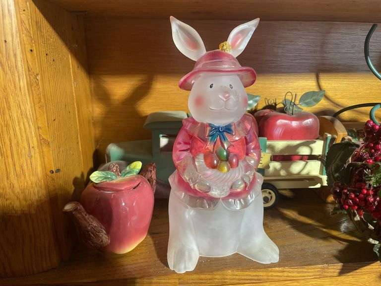 Contents of shelving including decorative Christmas buildings, ceramic planters, figurines & decor