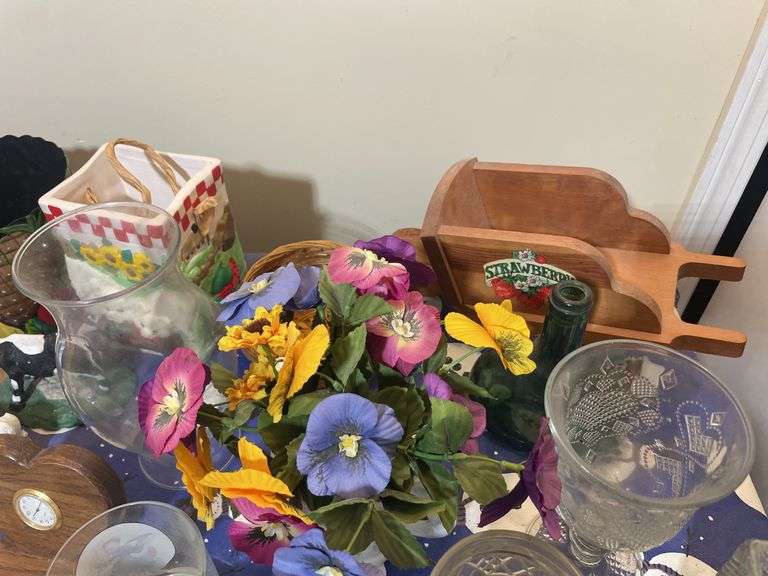 Large lot of glassware & household decor including pitcher, drinking glasses, old baby shoes and mor
