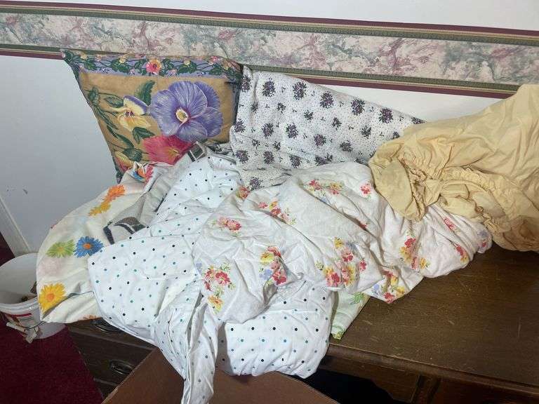 Box of materials, bedding, blankets, afghans and more