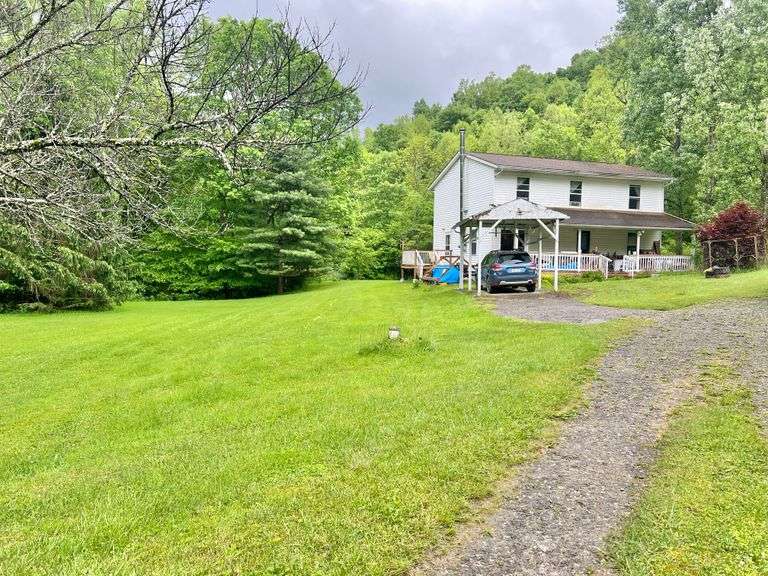 84.75+/- Acres & Home