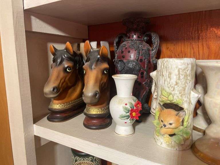 (2) shelves of glassware including bookends, vases, figurines & more
