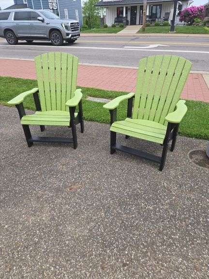 (2) green & black poly chairs