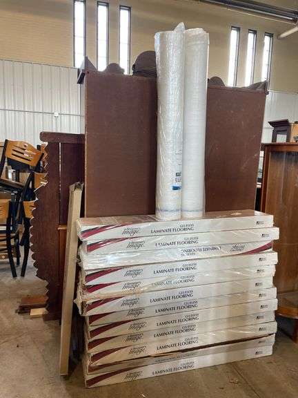 12 BOXES OF DESIGNER’S IMAGE GLUELESS LAMINATE FLOORING AND TWO ROLLS ...
