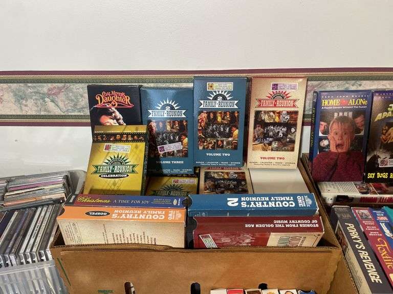 Large lot of VHS tapes, CD’s and DVDs