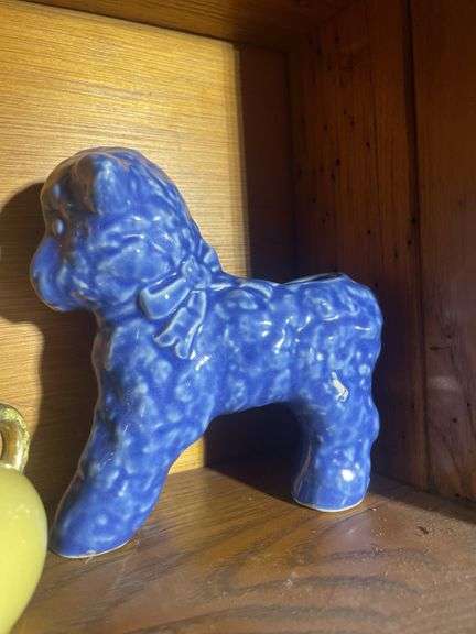 Contents of shelving including decorative Christmas buildings, ceramic planters, figurines & decor