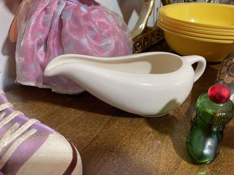 Box of decorative items including rooster clock, butterfly wall hanger, soap dispenser, kitchen item