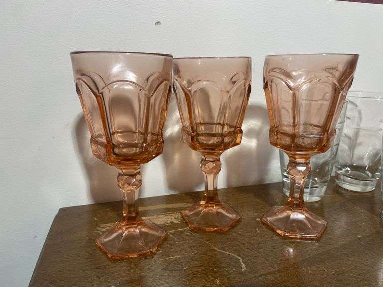 (6) pink water goblets and (4) matching drinking glasses