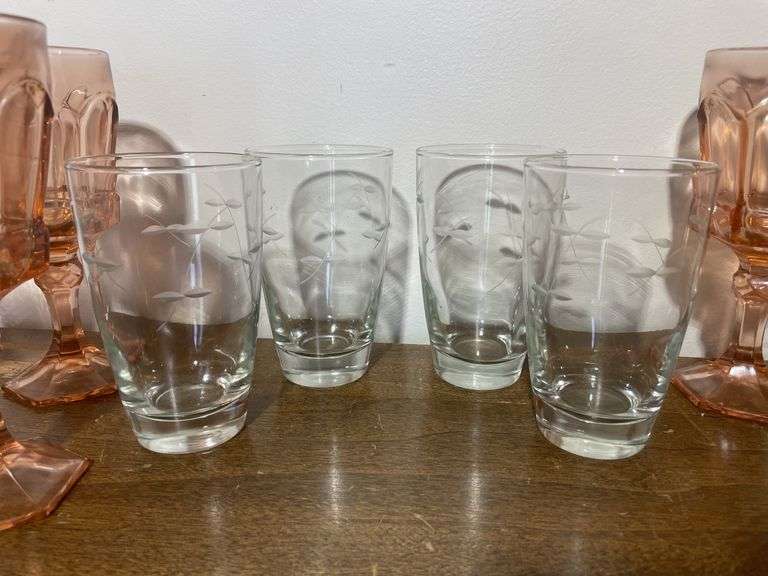 (6) pink water goblets and (4) matching drinking glasses