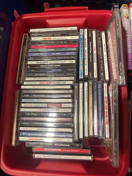Large lot of VHS tapes, CD’s and DVDs