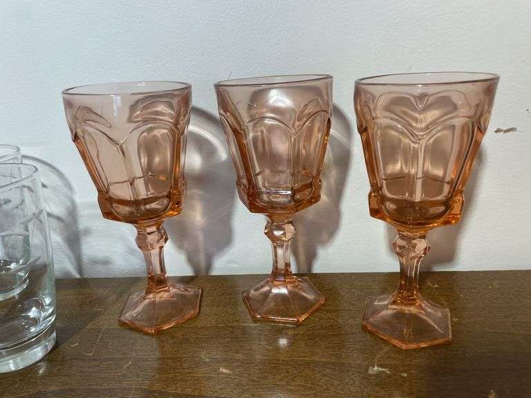 (6) pink water goblets and (4) matching drinking glasses