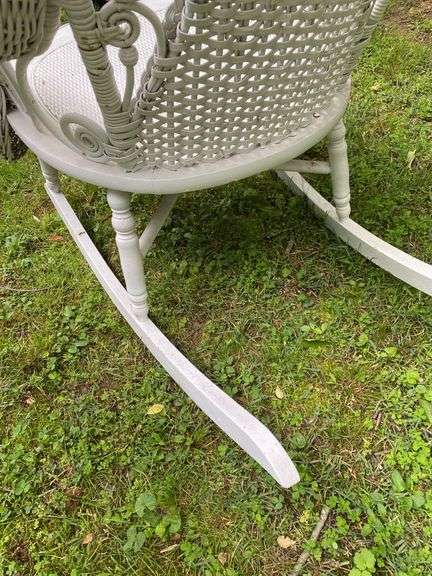 White Wicker Rocking Chair and Flower Basket