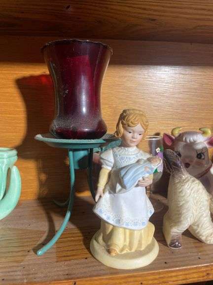 Contents of shelving including decorative Christmas buildings, ceramic planters, figurines & decor