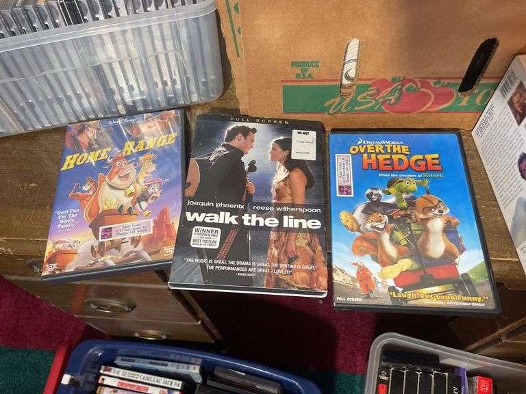 Large lot of VHS tapes, CD’s and DVDs