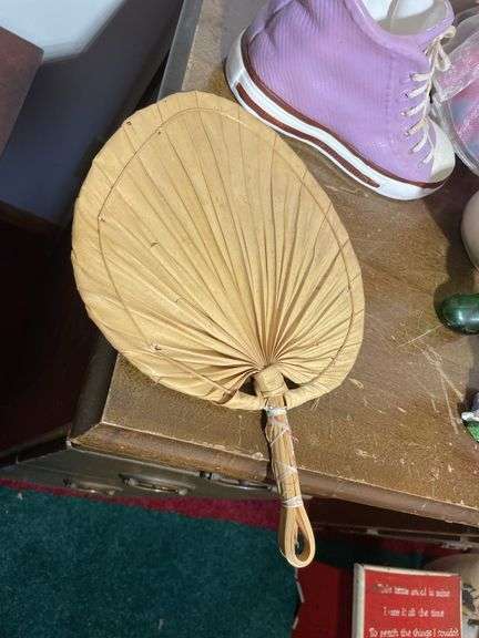 Box of decorative items including rooster clock, butterfly wall hanger, soap dispenser, kitchen item