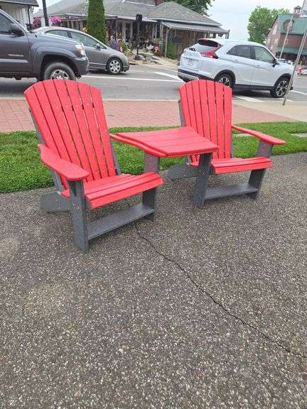(2) Red & gray poly chairs w/ connecting table