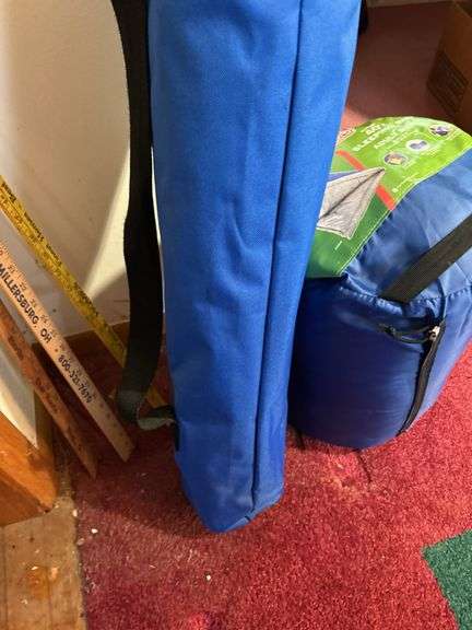 Coleman sleeping bag, lawn chair and yard sticks