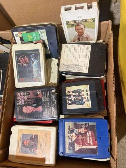 (2) boxes of 8 tracks and (2) boxes of records