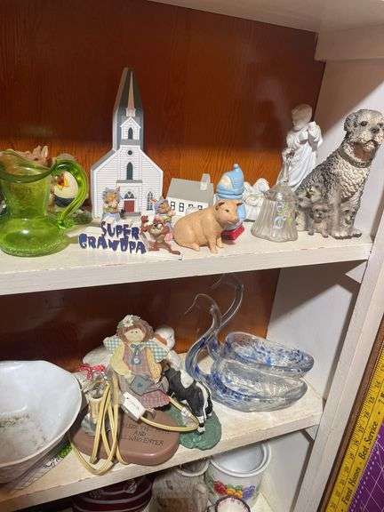 Contents of 3 shelves including decorative glassware- pitchers, bowl, basket, figurines & more