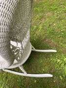 White Wicker Rocking Chair and Flower Basket