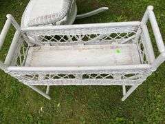 White Wicker Rocking Chair and Flower Basket