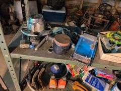 Metal shelving and wooden shelving - both with contents