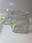 (2) Clear Glass Pitchers and (1) Clear Glass Dish w/ Lid